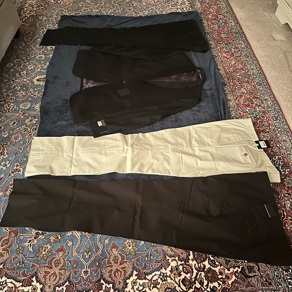 Barney’s suit 46R, Barney’s Beige pants 38 and Black Pants 38,